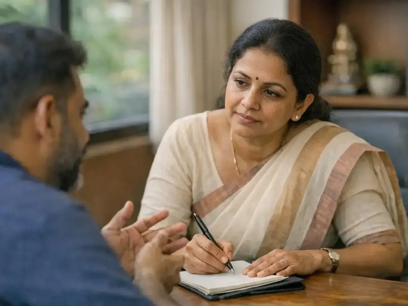 Supportive counselling session discussing ADHD screening results and next steps for Alangad family